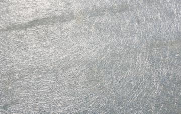 Nedging laminate fibreglass or shingles?