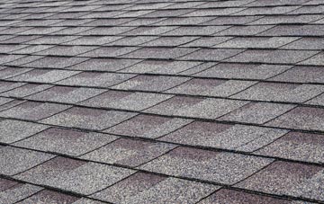 Nedging tiles for shallow pitch roofing